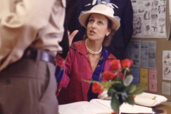 Signing the commemorative photo album